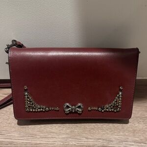 Coach Burgundy Crossbody Bag with Bow Accent